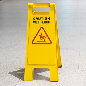 Hygiene supplies safety sign indicating that there's a wet floor