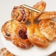 Assorted Danish Pastries 100g on a white background