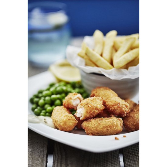 Breaded Scampi 1lb on a plate with chips, peas, and tartar sauce