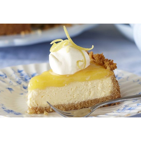 Image of Luxury Lemon Cheese Cake Lemon Cheesecake with One Slice being lifted