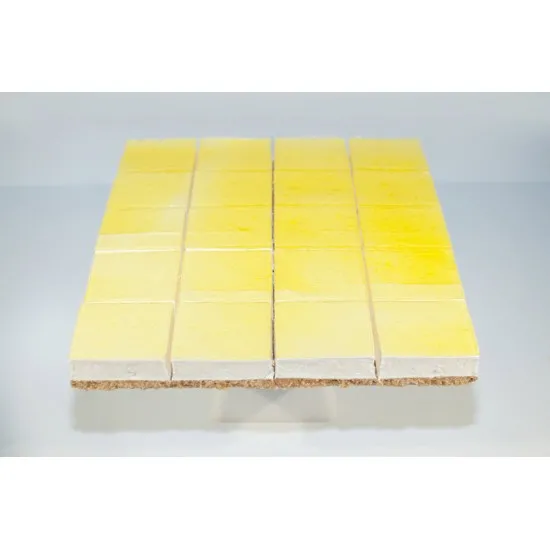 Lemon Cheesecake Tray Bake on a white background