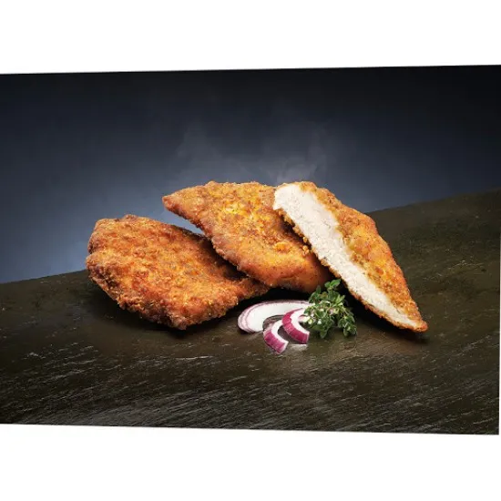 Southern Fried Chicken on a serving platter with potatoes, sauce, and corn