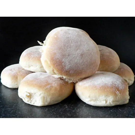 3 White Floury Baps on wooden board