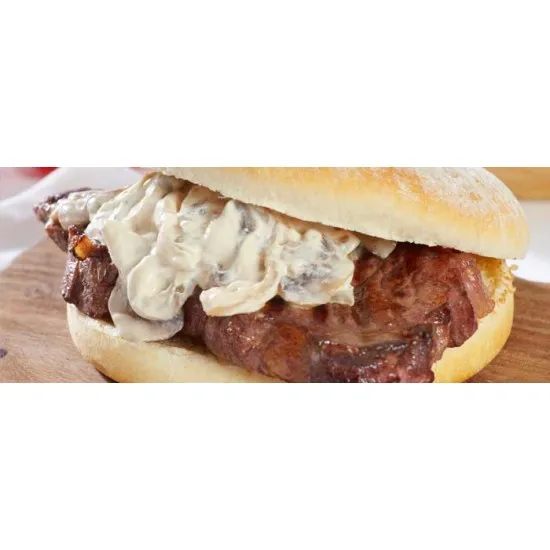 3 White Floury Baps on wooden board