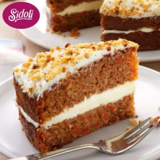 Sidoli Gluten Free Carrot Cake Slice on a grey stonecast plate