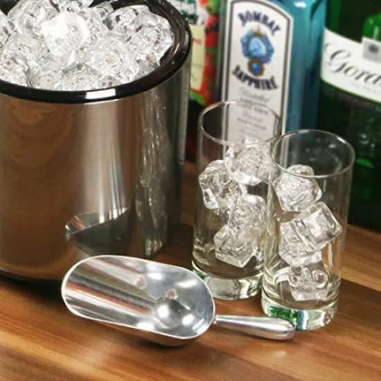 Aluminium Ice / Flour Scooper with a Glass Of Cola Beside it Filled with Ice
