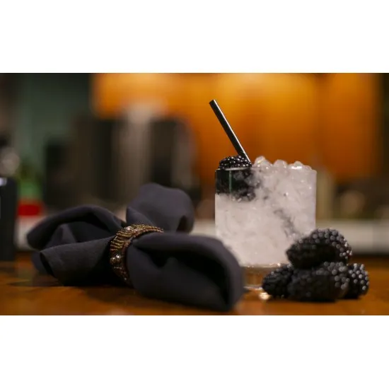 Black Paper Straws in a Jug