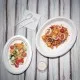 Fiesta Green Oval Bagasse Plate 12 1/2x10 X 50''